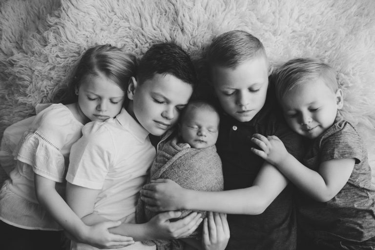 black and white photo of newborn and 4 siblings-Clients' Kind words & Reviews