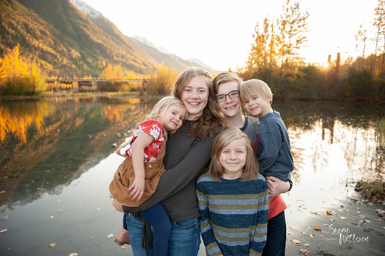 five children pose for fall family portraits in Alaska