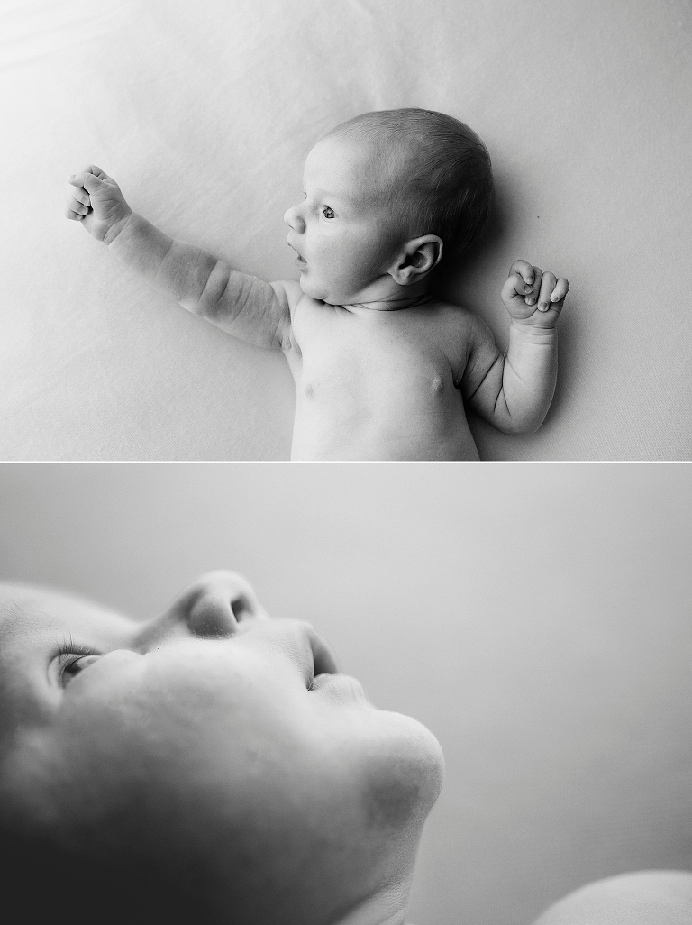 baby boy stretches during classic newborn portraits