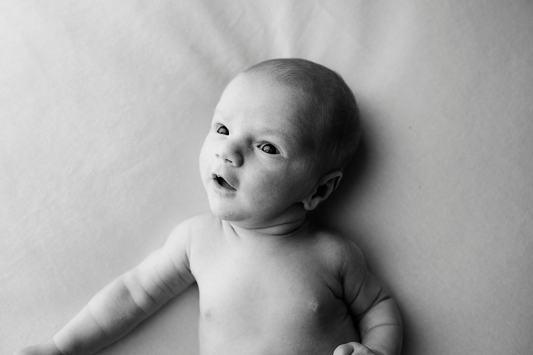 classic black and white newborn portrait of baby boy