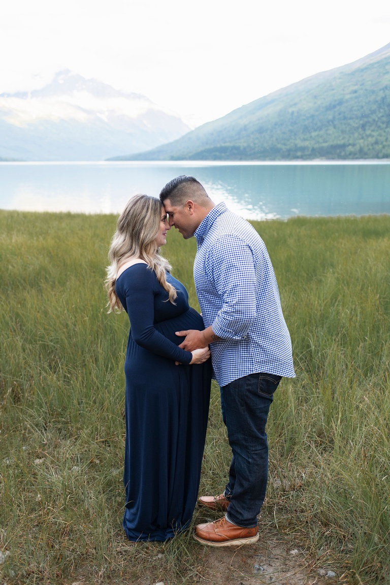 husband stands nose to nose with pregnant wife in Alaska 