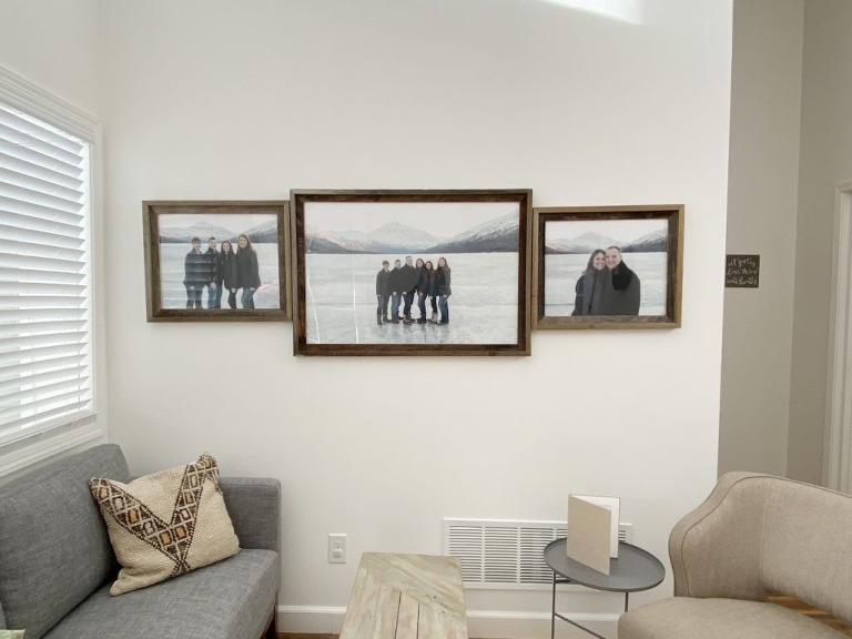photographs displayed on wall to show products offered and the investment